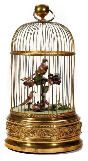 HANGING BIRD CAGE automaton, in bronze, the cage contain…