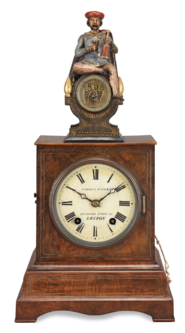 Black Forest brass-inlaid walnut automata clock